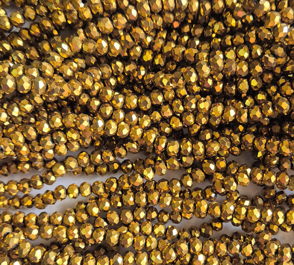 Грановані намистини 4х3 мм (кришталь) золотисті 41 см (близько 110 намистин)